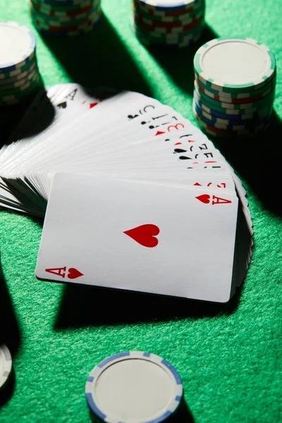 Caishen Wins slot game interface showing five reels and spin controls